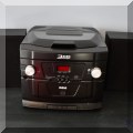 E04. RCA stereo with CD and cassette tape players. 